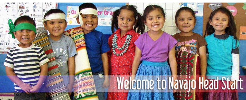 Welcome to Navajo Head Start, photo of children smiling in traditional dress